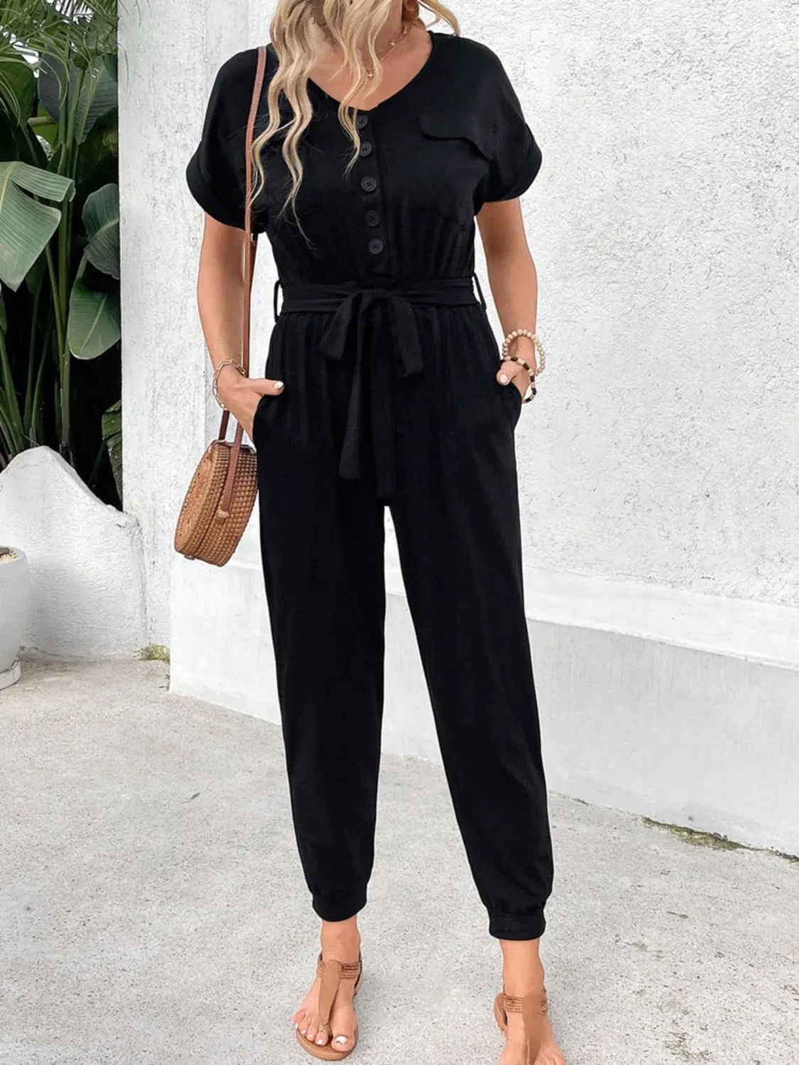 V-Neck Short Sleeve Jumpsuit sold by Charming Charlie