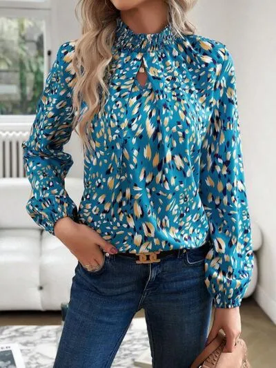 Cutout Printed Mock Neck Balloon Sleeve Blouse sold by Charming Charlie