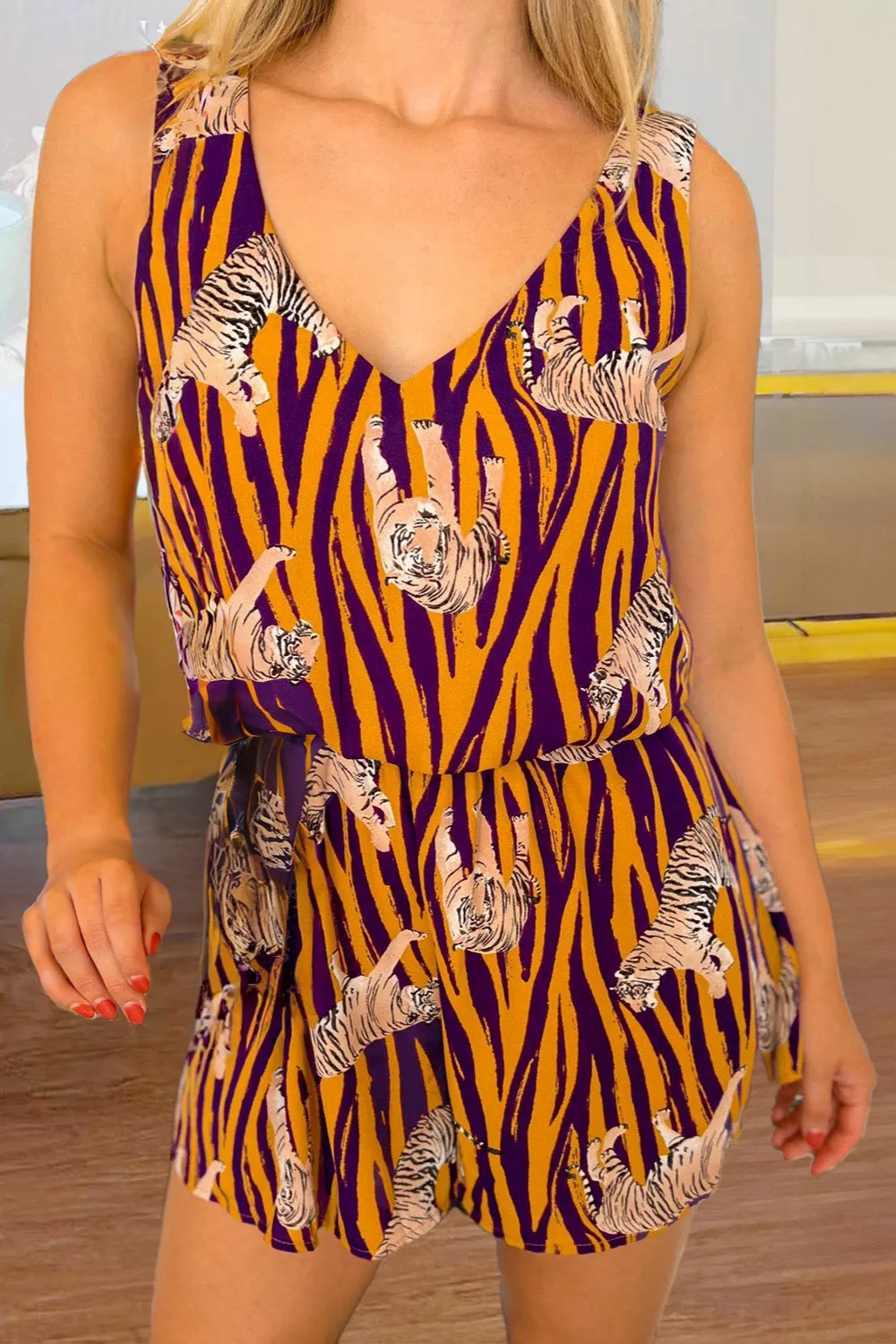 Tiger Print V-Neck Wide Strap Romper sold by Charming Charlie