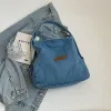 Adjustable Strap Denim Shoulder Bag sold by Charming Charlie