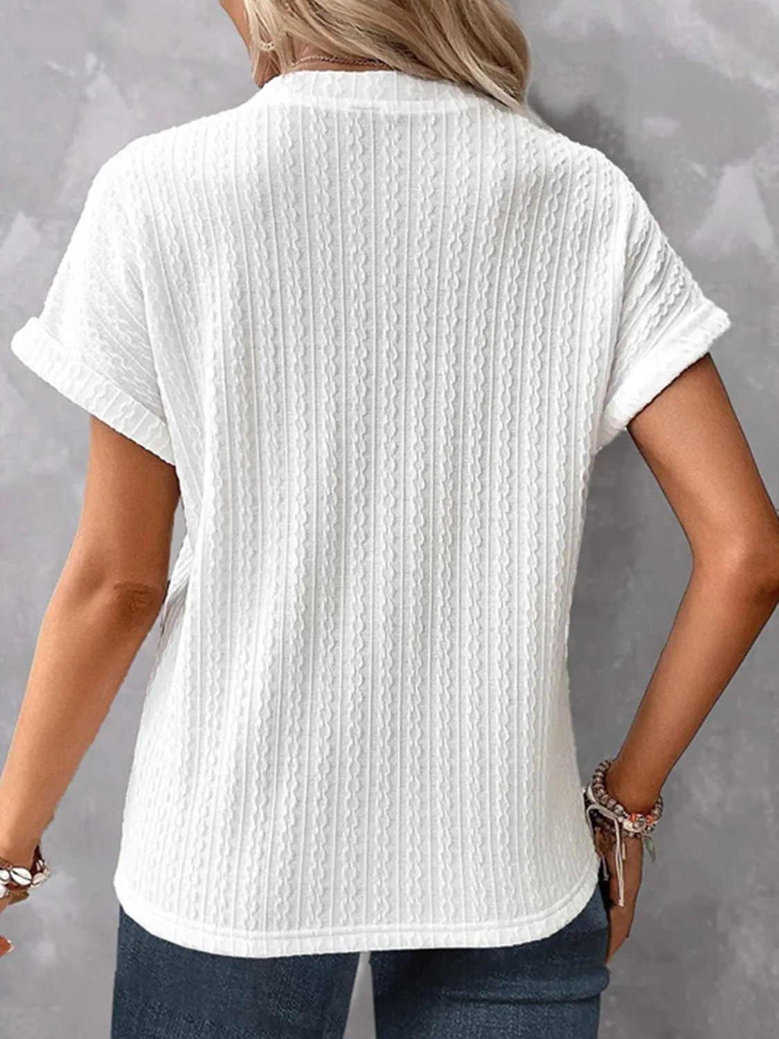 Textured Notched Short Sleeve Blouse sold by Charming Charlie product image thumbnail 2