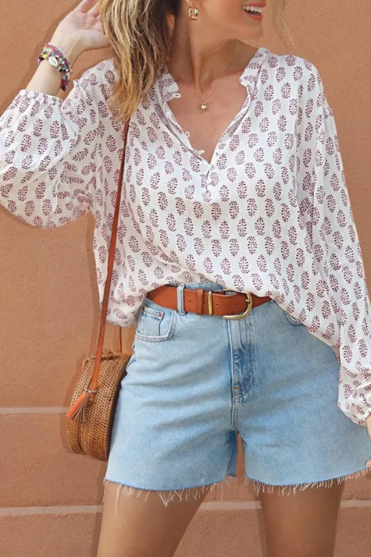 Printed Half Button Long Sleeve Blouse sold by Charming Charlie