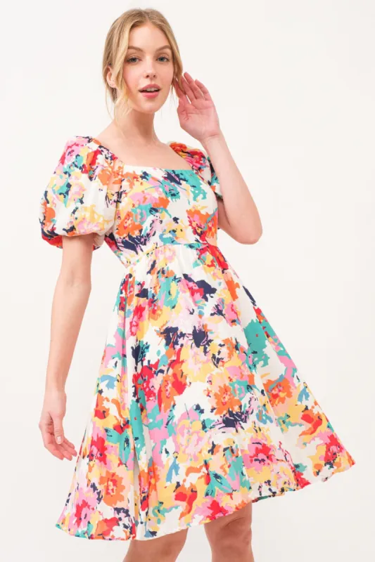 And The Why Square Neck Puff Sleeve Floral Dress sold by Charming Charlie