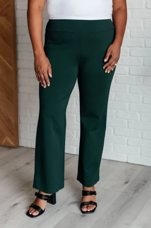 Magic Straight Pants in Hunter Green sold by Charming Charlie