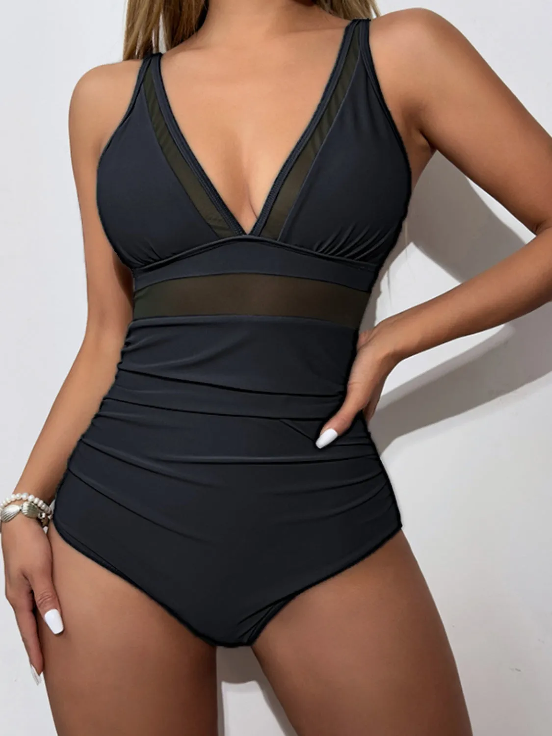 V-Neck One-Piece Swimwear sold by Charming Charlie
