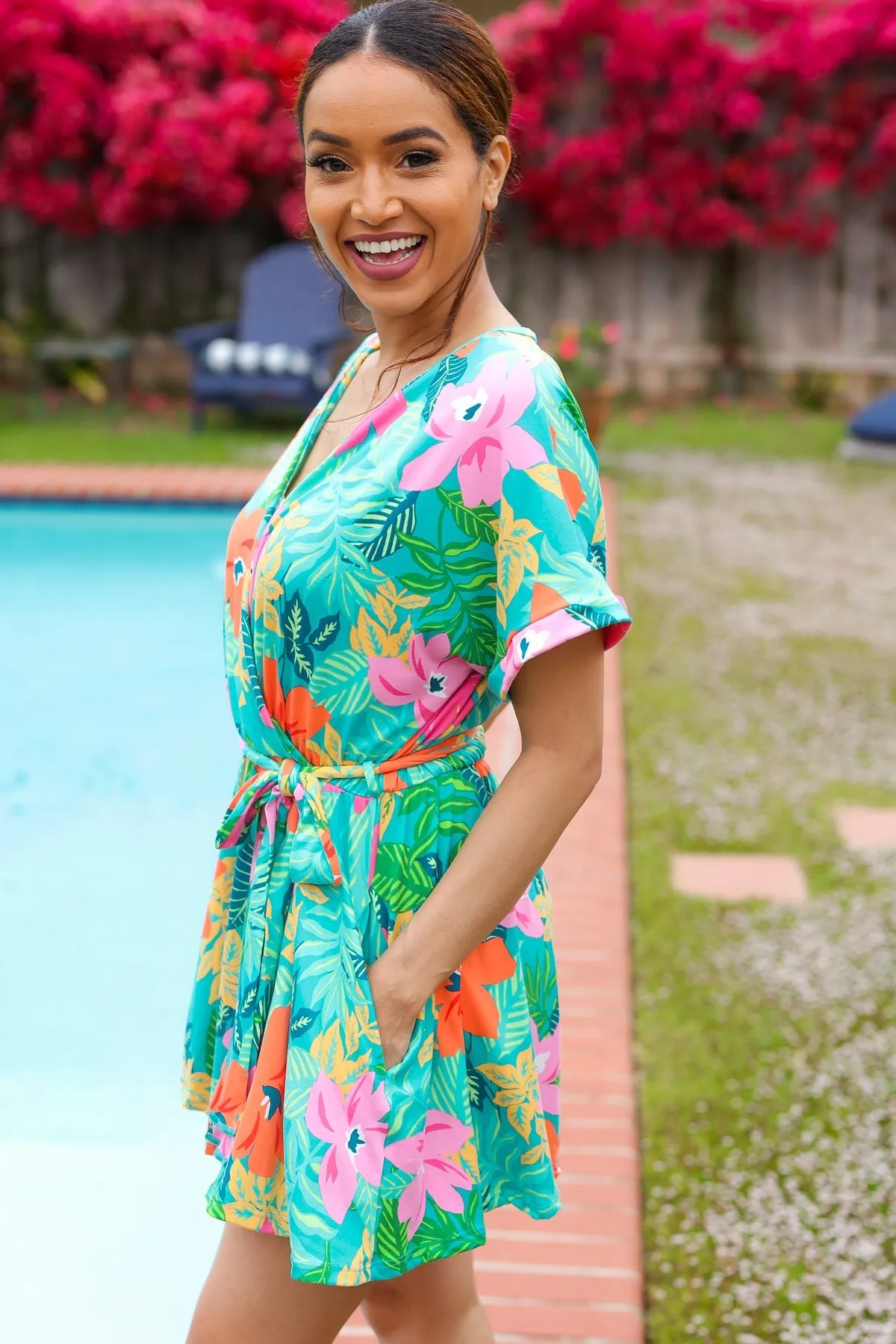 Tropical Vibes Turquoise Floral Surplice Tie Waist Romper sold by Charming Charlie product image thumbnail 4