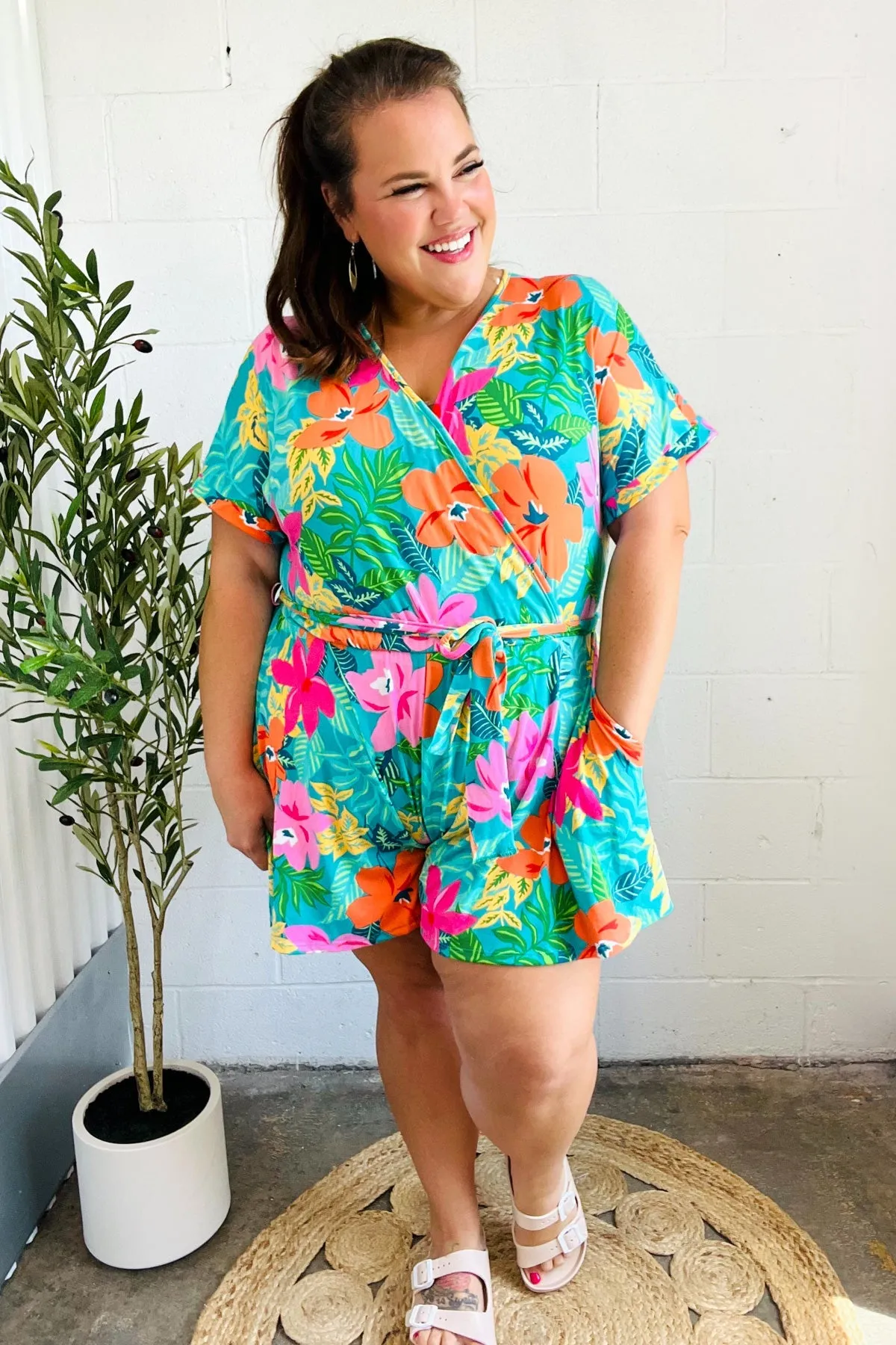 Tropical Vibes Turquoise Floral Surplice Tie Waist Romper sold by Charming Charlie product image thumbnail 5