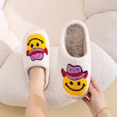Melody Smiley Face Slippers sold by Charming Charlie