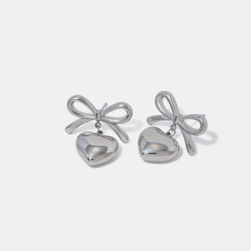 Stainless Steel Bow & Heart Drop Earrings sold by Charming Charlie