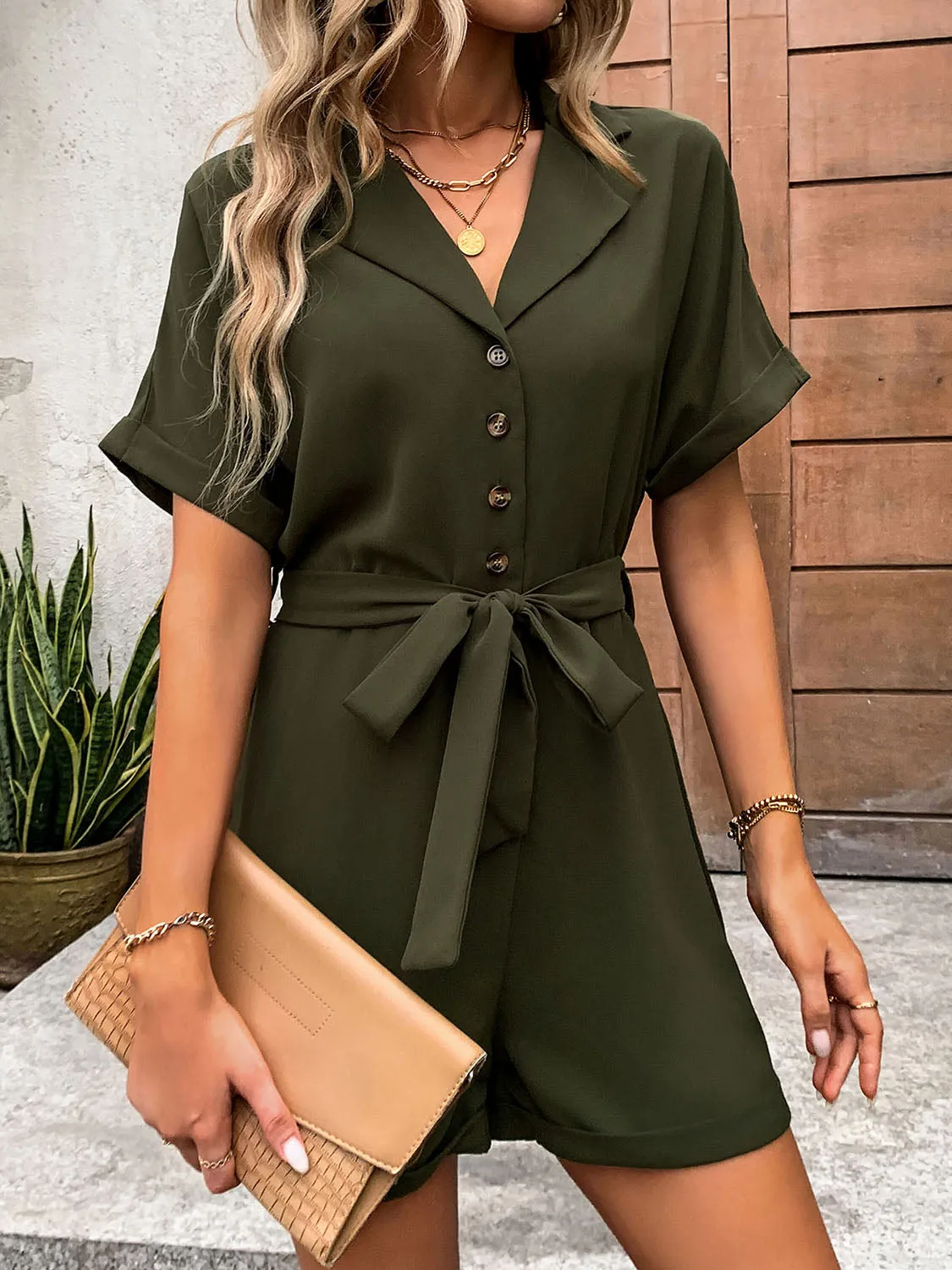 Half Button Tie Waist Short Sleeve Romper sold by Charming Charlie product image thumbnail 3