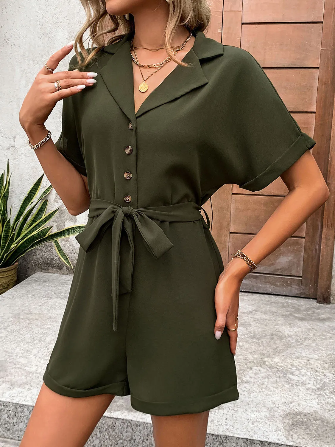 Half Button Tie Waist Short Sleeve Romper sold by Charming Charlie product image thumbnail 5