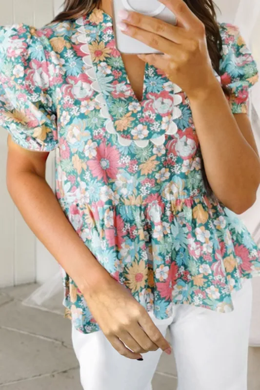 Printed Notched Short Sleeve Blouse sold by Charming Charlie