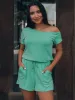 Single Shoulder Short Sleeve Romper sold by Charming Charlie