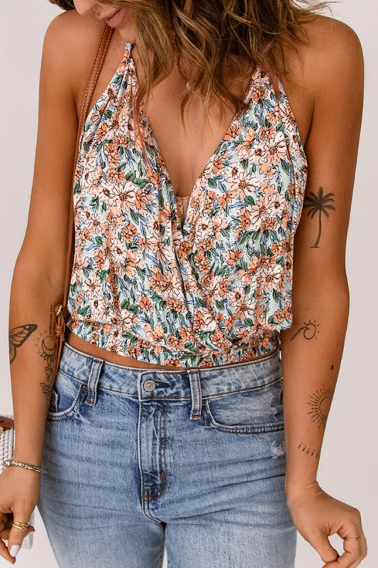 Floral Elastic Waist Cropped Cami sold by Charming Charlie