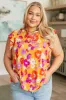 Lizzy Flutter Sleeve Top in Apricot and Red Floral sold by Charming Charlie