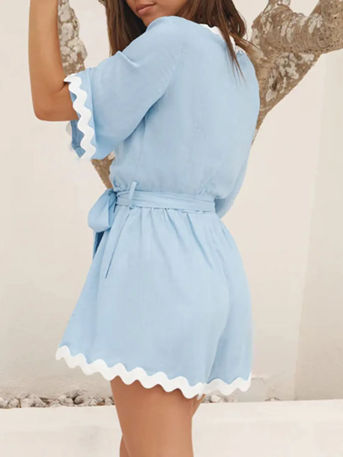 Contrast Trim Surplice Tie Waist Romper sold by Charming Charlie product image thumbnail 4