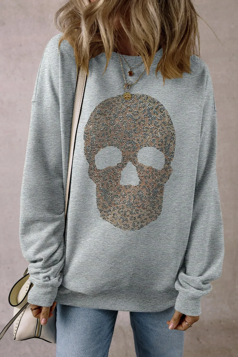Skull Round Neck Long Sleeve Sweatshirt sold by Charming Charlie