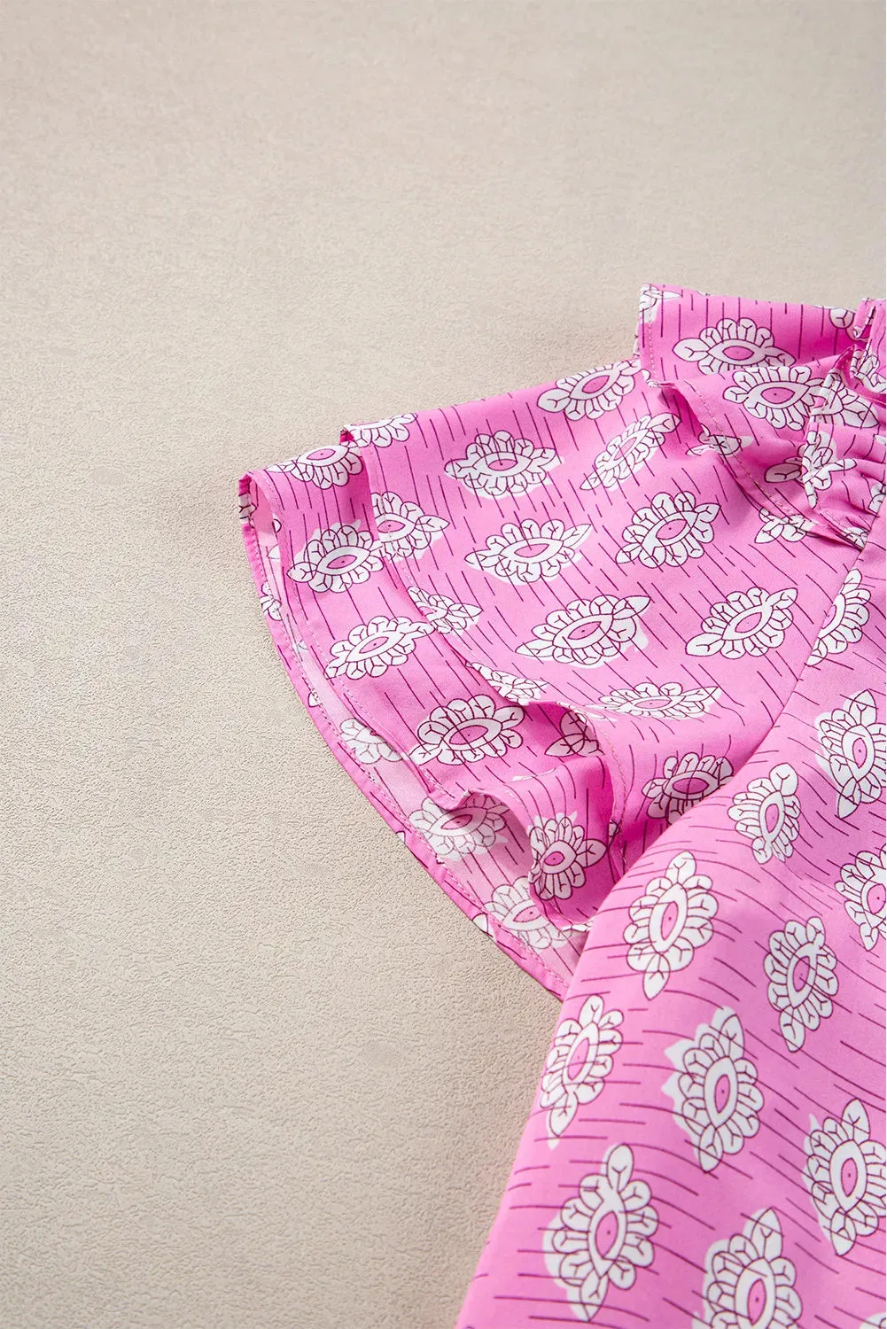 Ruffled Printed Tie Neck Short Sleeve Blouse sold by Charming Charlie product image thumbnail 4