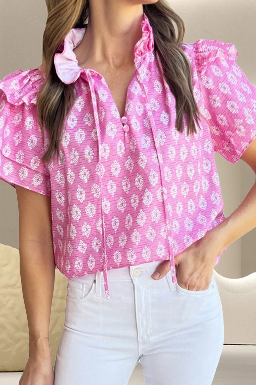 Ruffled Printed Tie Neck Short Sleeve Blouse sold by Charming Charlie