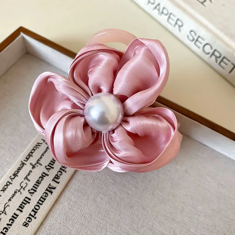 Flower Acrylic Hair Claw Clip sold by Charming Charlie