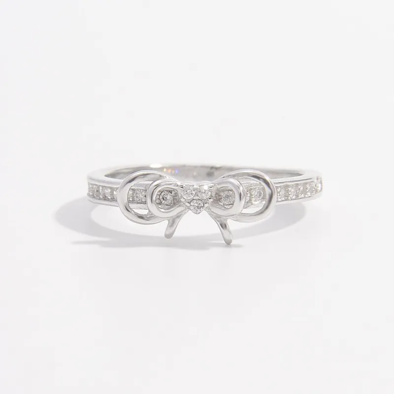 925 Sterling Silver Inlaid Zircon Bow Ring sold by Charming Charlie