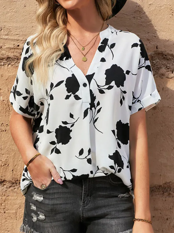 Full Size Printed Notched Short Sleeve Blouse sold by Charming Charlie