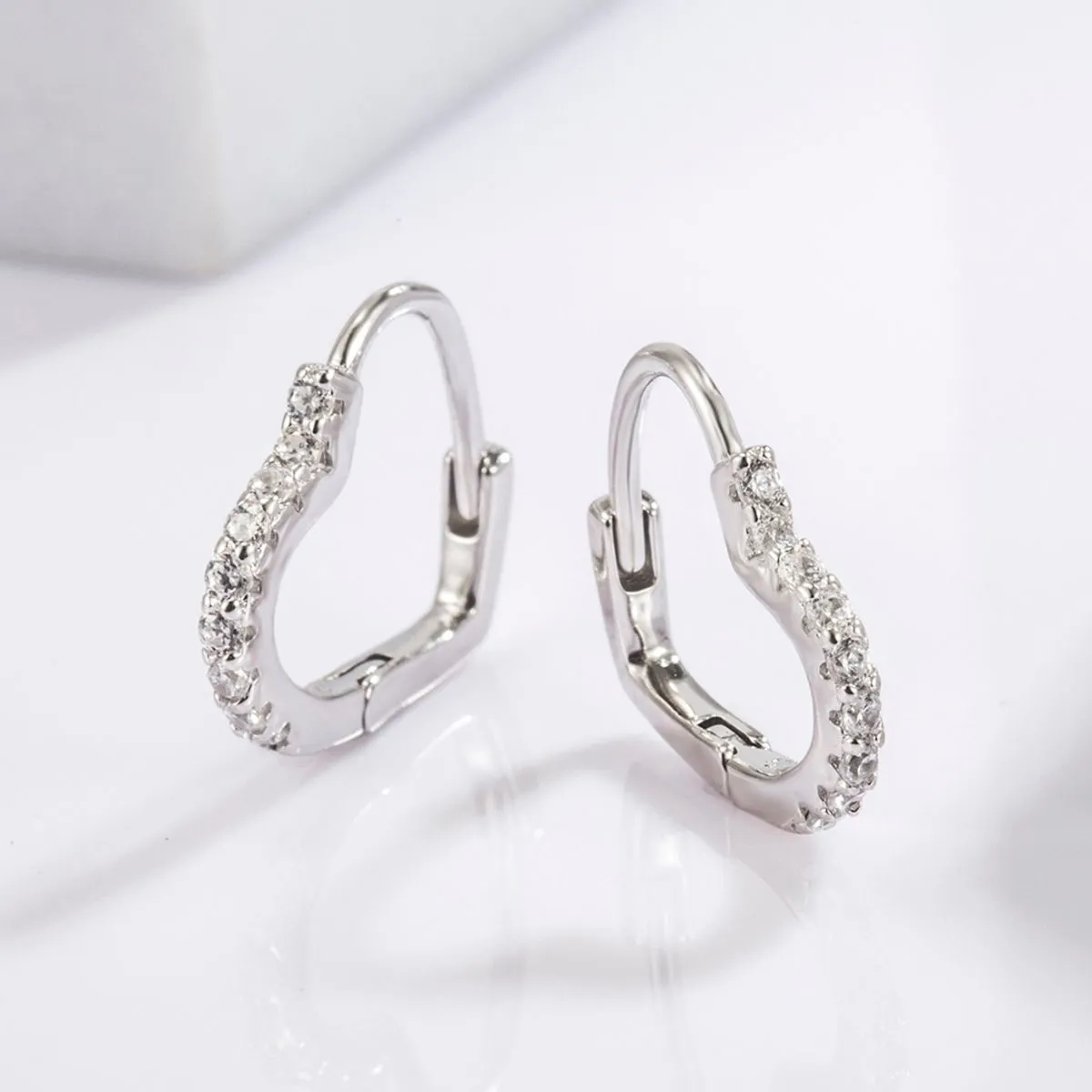 925 Serling Silver Zircon Heart Shape Earrings sold by Charming Charlie product image thumbnail 4