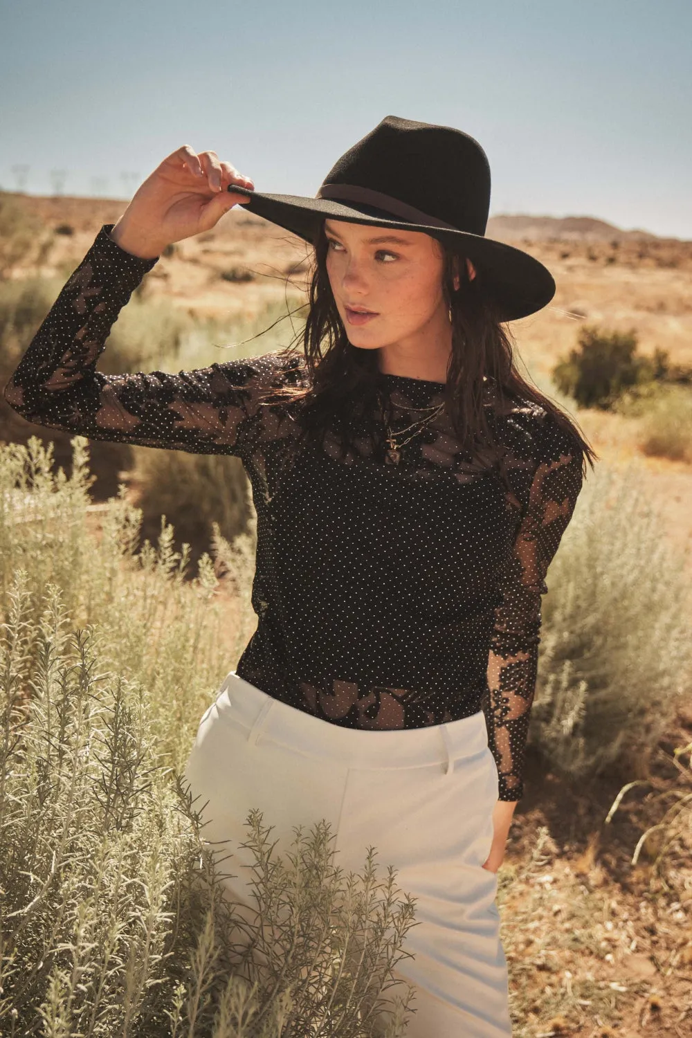 Ces Femme Floral Lace Mesh Bodysuit sold by Charming Charlie