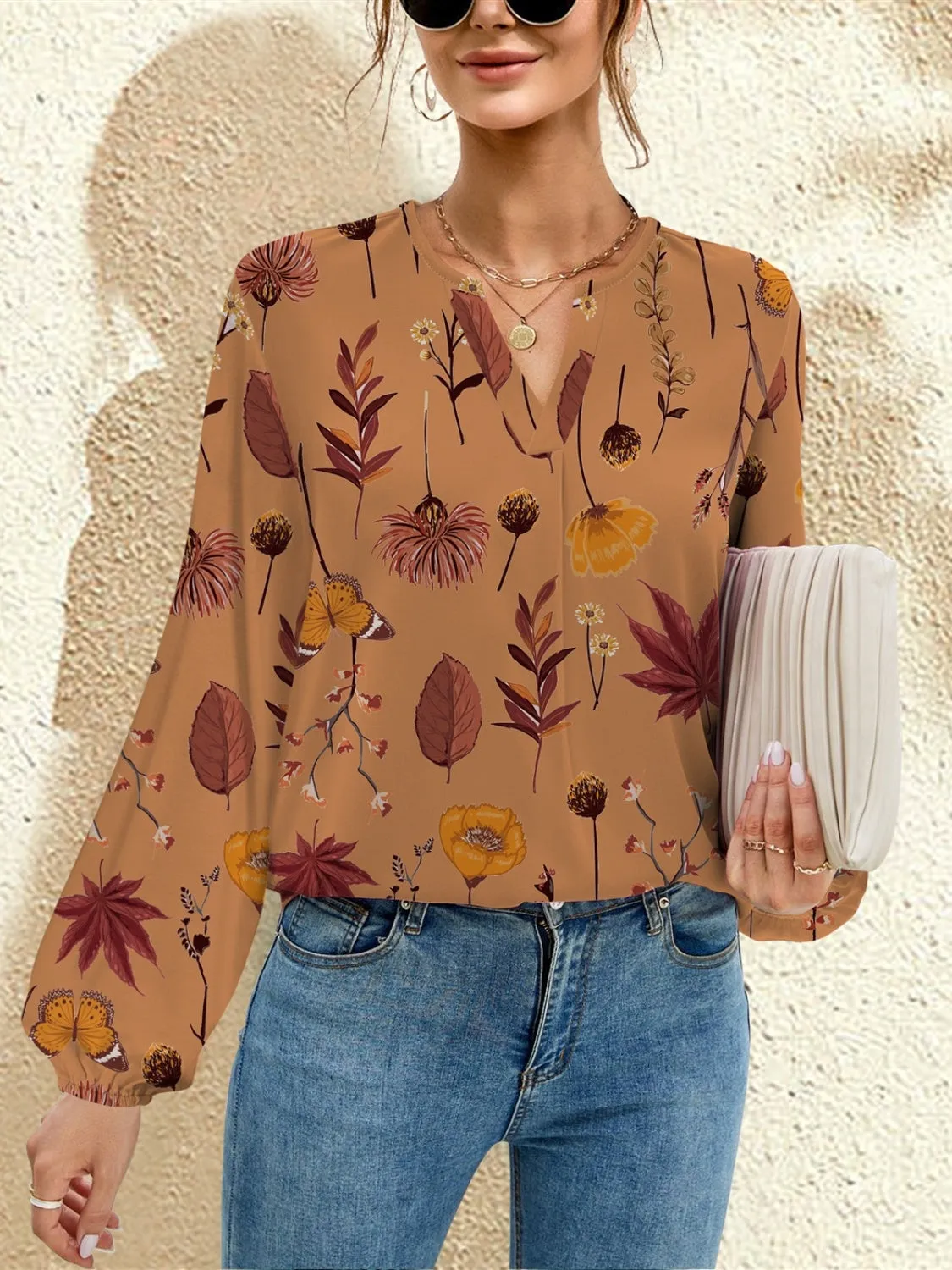 Printed Notched Long Sleeve Blouse sold by Charming Charlie