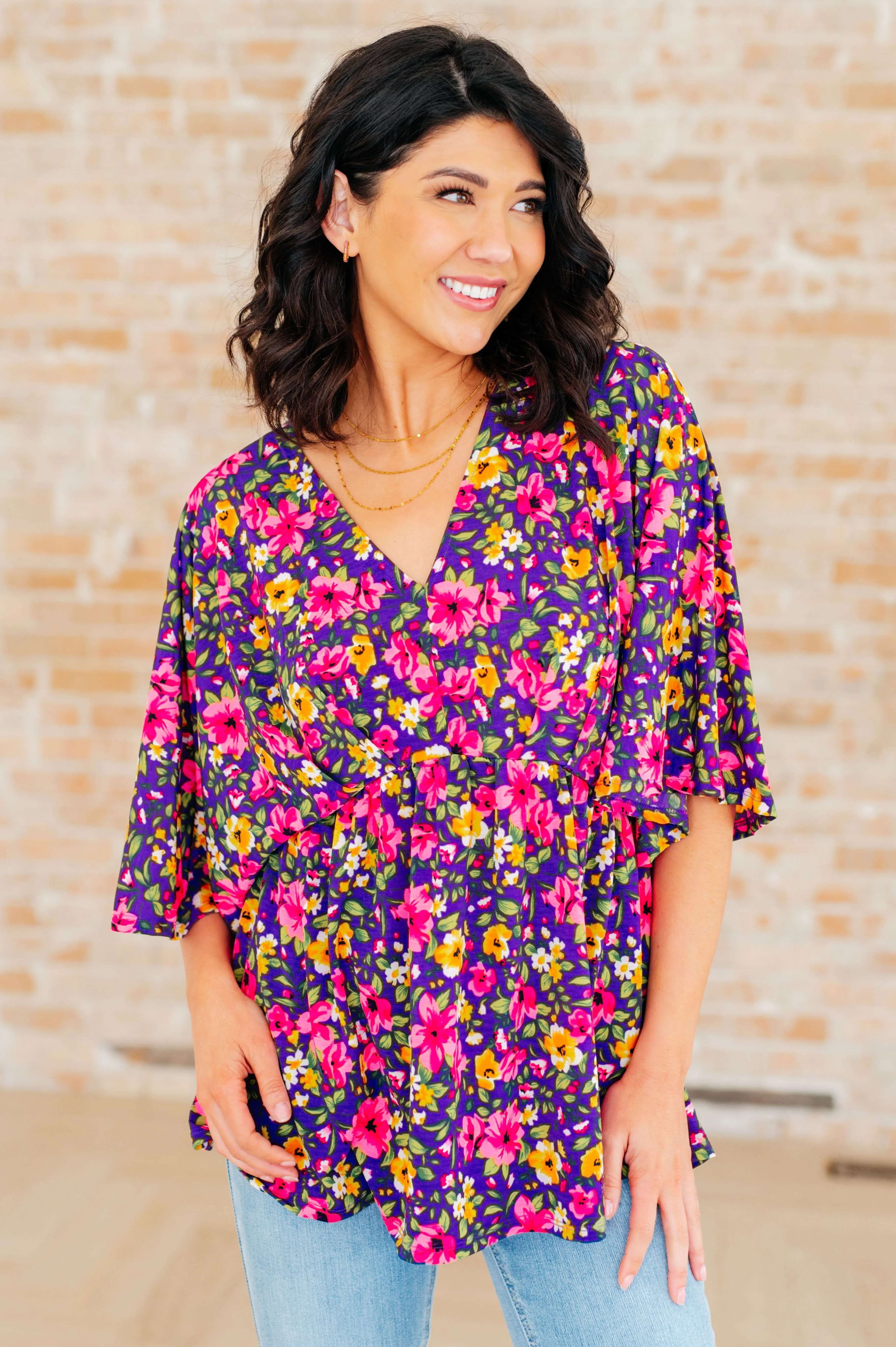 Dreamer Peplum Top in Purple and Pink Floral sold by Charming Charlie