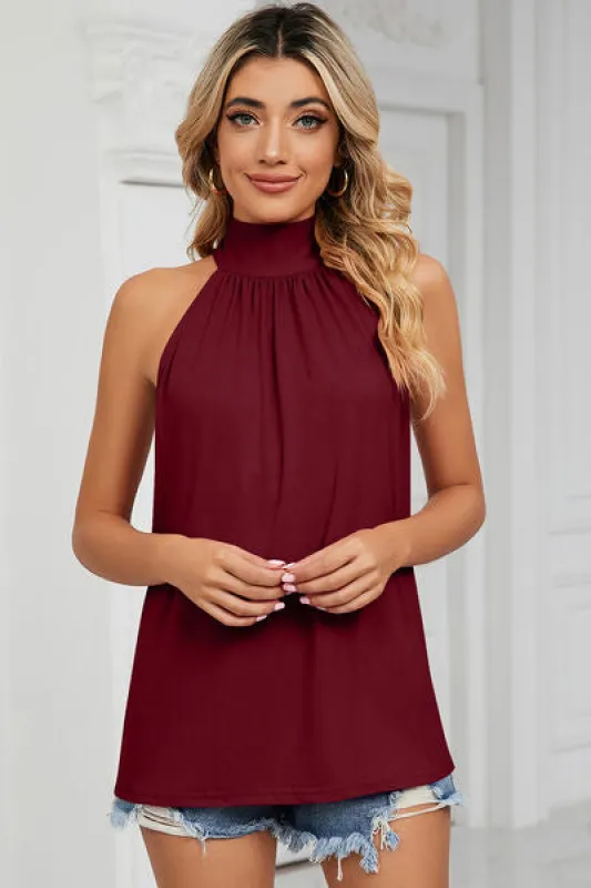 Tied Grecian Neck Tank sold by Charming Charlie