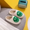 Melody Smiley Face Slippers sold by Charming Charlie