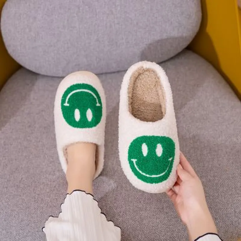 Melody Smiley Face Slippers sold by Charming Charlie