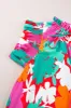 Printed Tie Neck Cap Sleeve Blouse sold by Charming Charlie