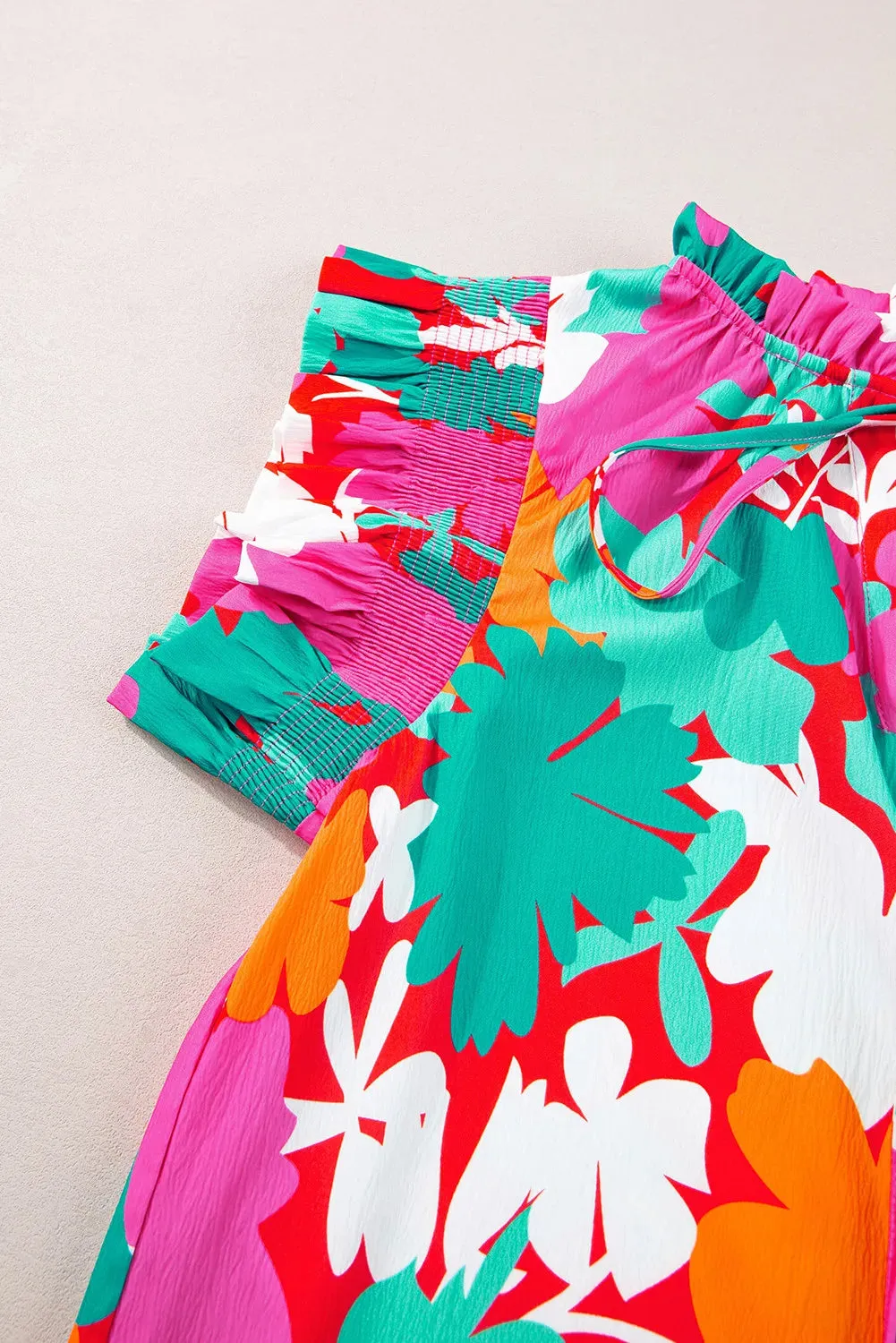 Printed Tie Neck Cap Sleeve Blouse sold by Charming Charlie product image thumbnail 4