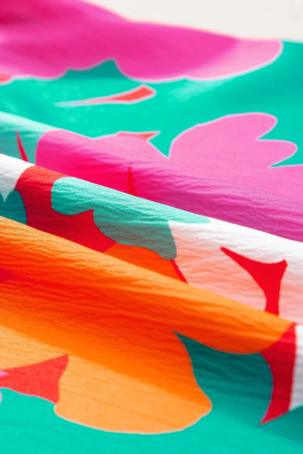 Printed Tie Neck Cap Sleeve Blouse sold by Charming Charlie product image thumbnail 5