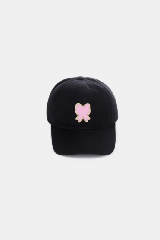 Zenana Ribbon Bow Chenille Patch Baseball Cap sold by Charming Charlie