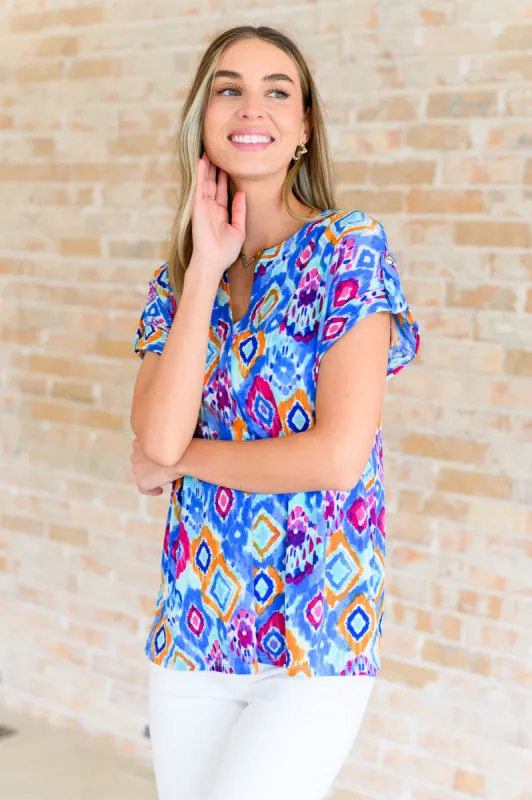 Lizzy Cap Sleeve Top in Blue and Magenta Ikat sold by Charming Charlie