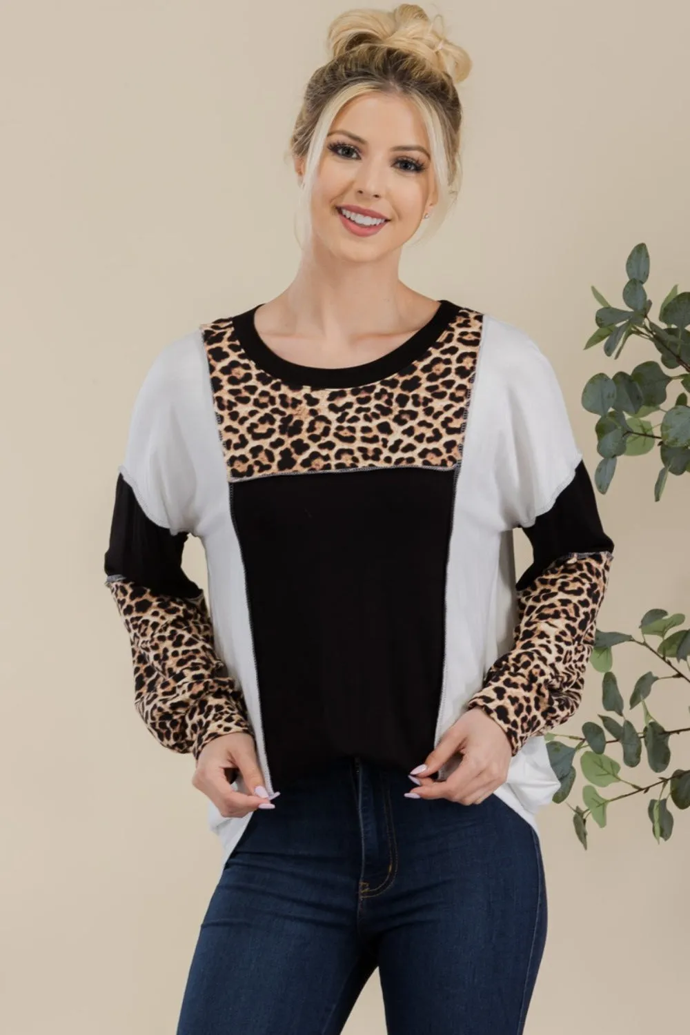 Celeste Full Size Leopard Color Block Exposed Seam T-Shirt sold by Charming Charlie