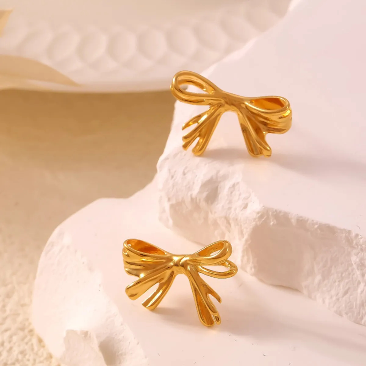 Titanium Steel Stud Earrings sold by Charming Charlie product image thumbnail 2