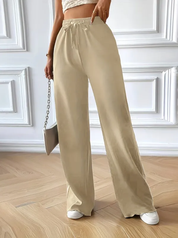 Full Size Drawstring Pocketed Wide Leg Pants sold by Charming Charlie