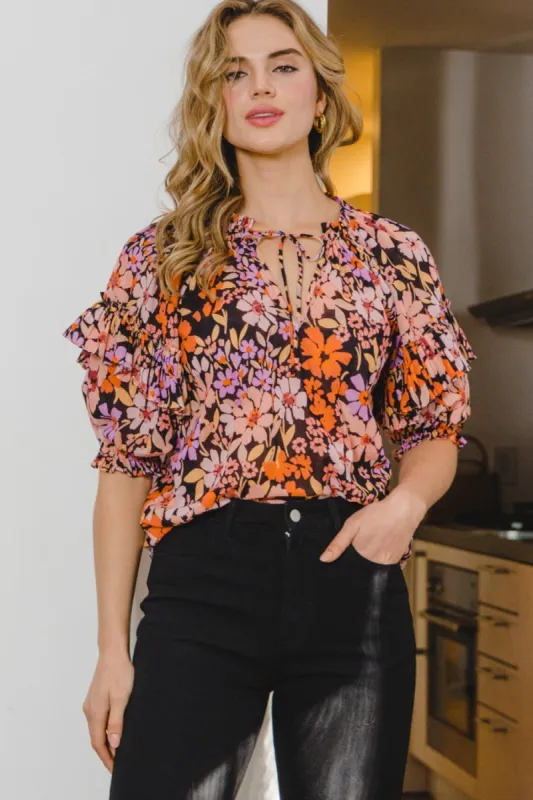 ODDI Full Size Floral Tie Neck Ruffled Blouse sold by Charming Charlie