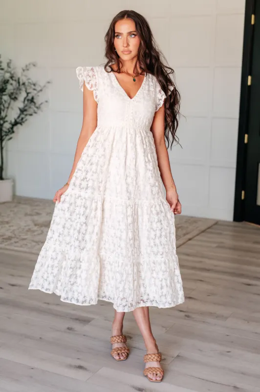 It's Giving Goddess V-Neck Flutter Sleeve Dress sold by Charming Charlie