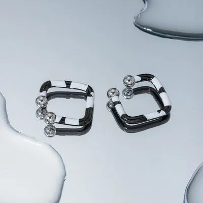 Stainless Steel Oil Drip Cuff Earrings sold by Charming Charlie product image thumbnail 2