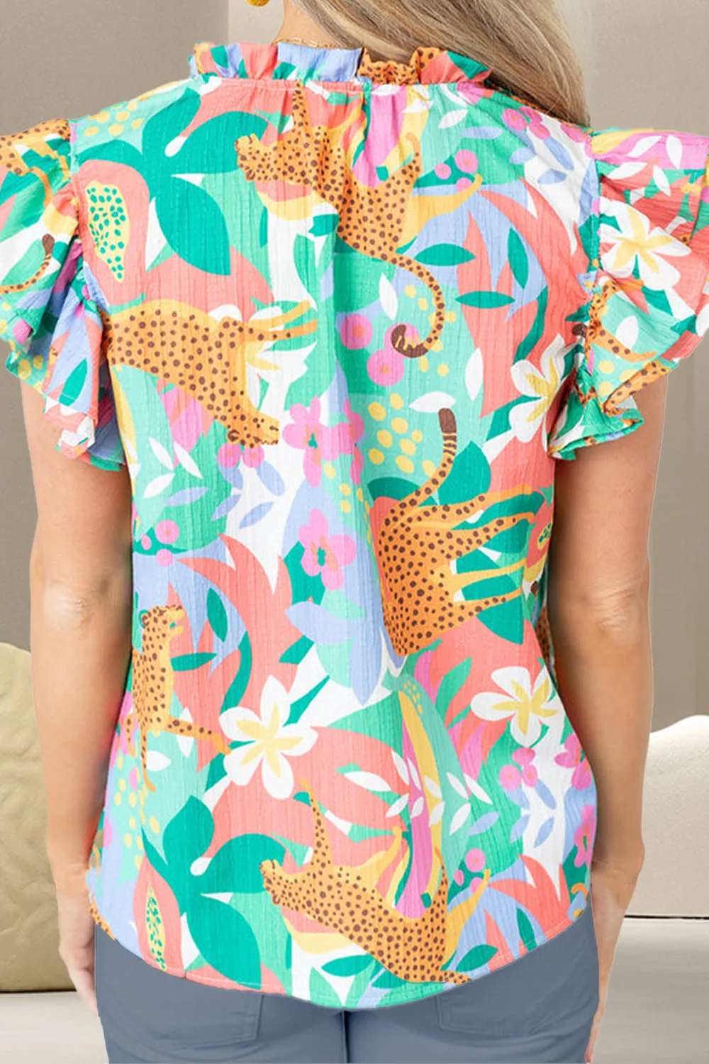Ruffled Printed Tie Neck Cap Sleeve Blouse sold by Charming Charlie product image thumbnail 3
