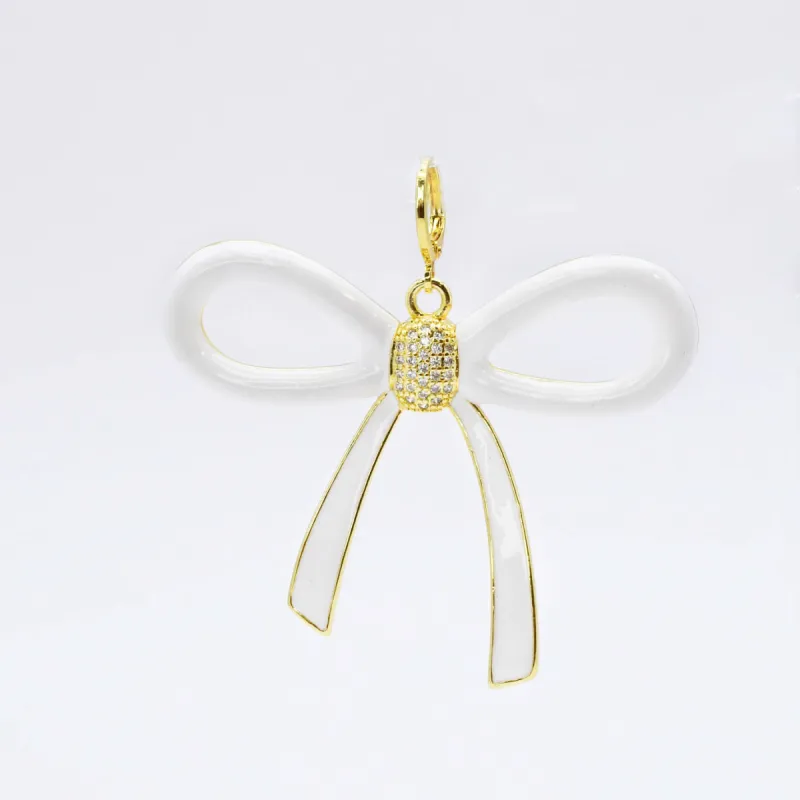 Oversize White Bow Charm sold by Charming Charlie