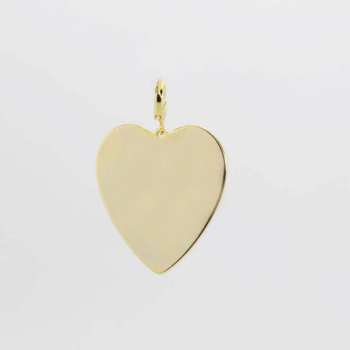 Gold Big Heart sold by Charming Charlie