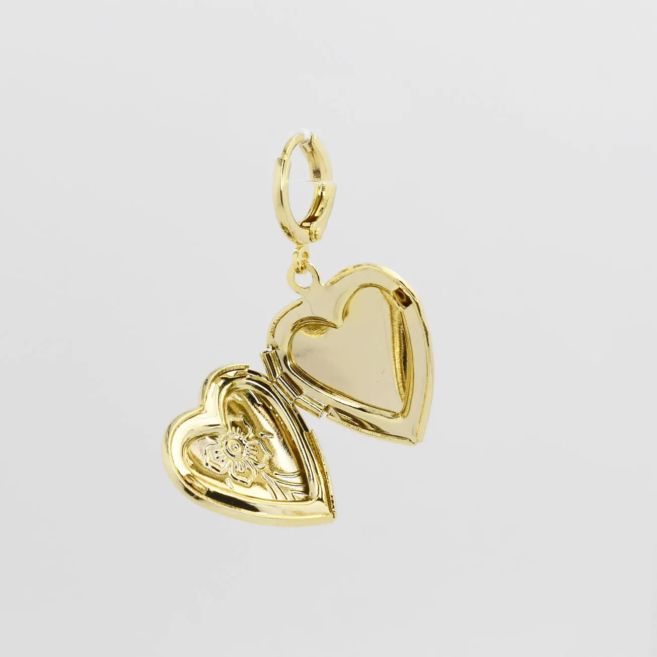 Holding Memory Heart Charm sold by Charming Charlie product image thumbnail 2