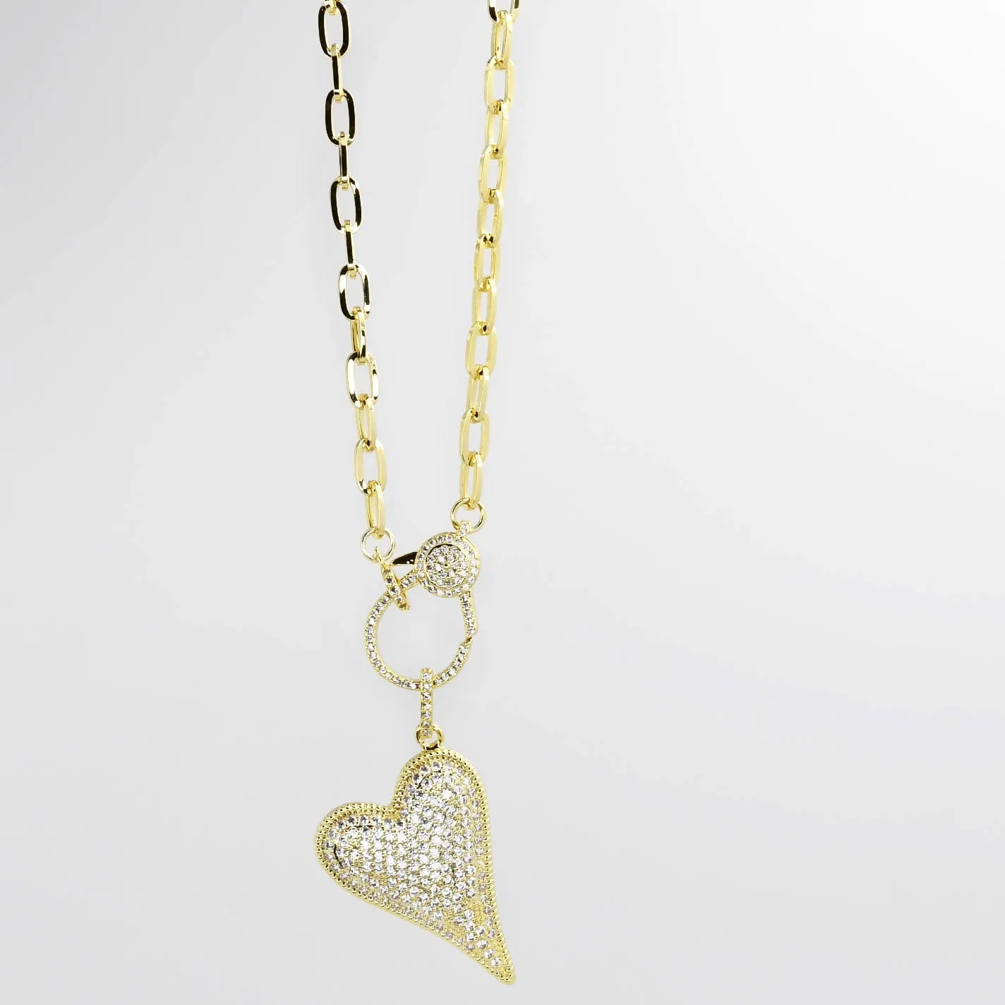 Gold Clip Heart J14 sold by Charming Charlie