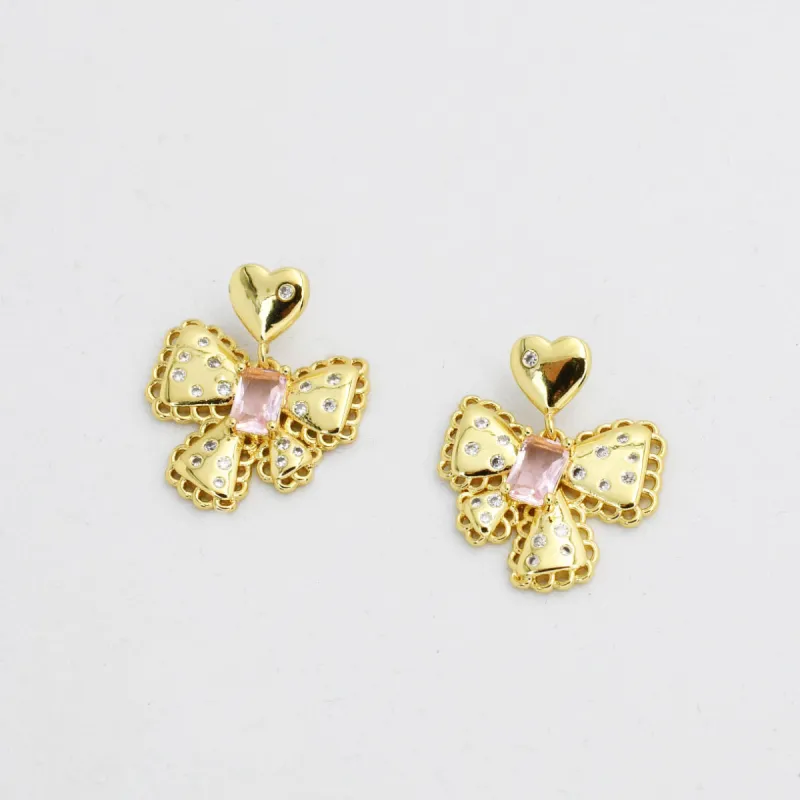 Bow Heart Studs sold by Charming Charlie